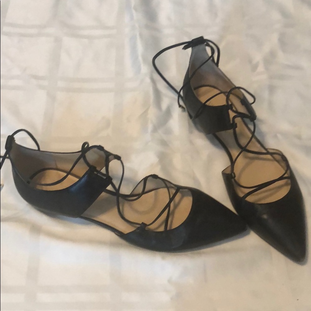 Pointed toe lace up flat